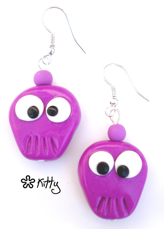 _stupid_skull_lilac_earrings_by_kitica.jpg